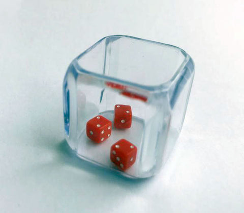 Three identical dice in a cube