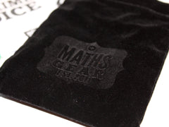 Close-up of the fabric bag, which has the Maths Gear logo embossed in the velvet on the front