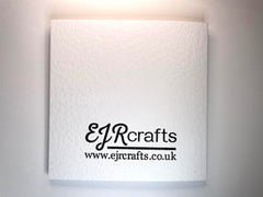 Photo of the back of one of the cards, stamped with a logo which says EJRcrafts and the url www.ejrcrafts.co.uk